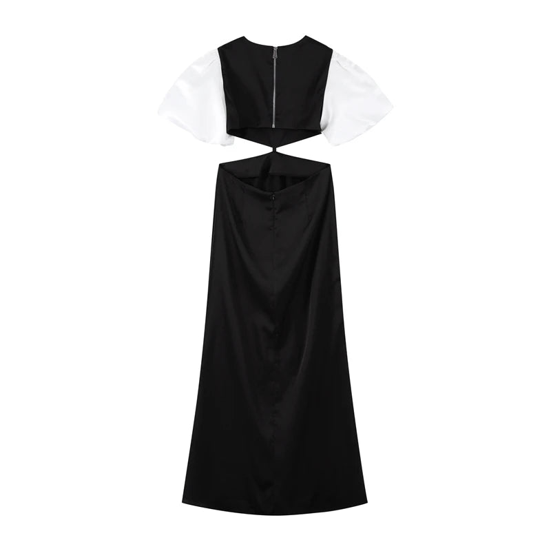 Vestido Margot visto por tras, destacando a amarracao ajustavel e mangas bufantes brancas sobre fundo branco