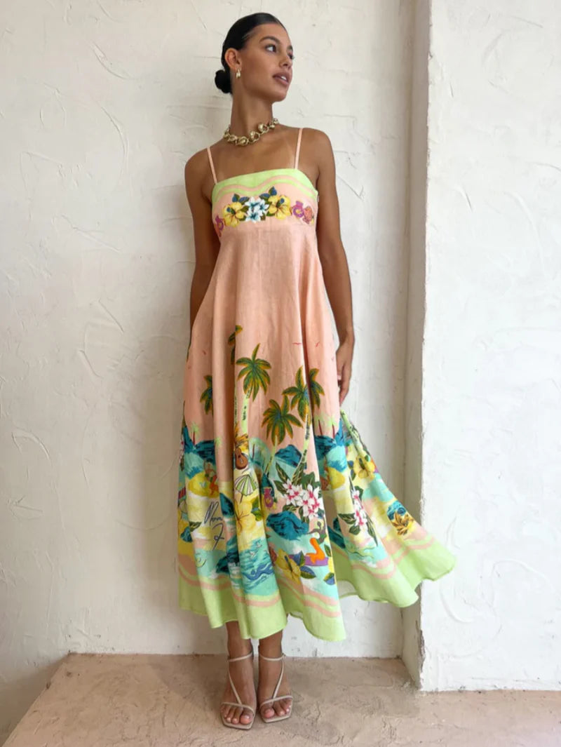 Vestido midi tropical com estampa praiana, modelagem soltinha e decote reto, foto frontal inteira.