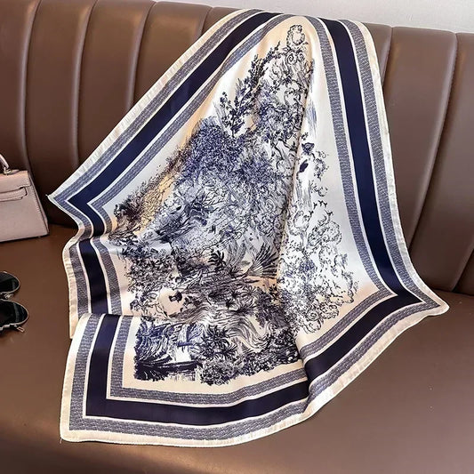 Lenco Versatile Grace com estampa toile de jouy azul marinho e acabamento sofisticado sobre banco de couro
