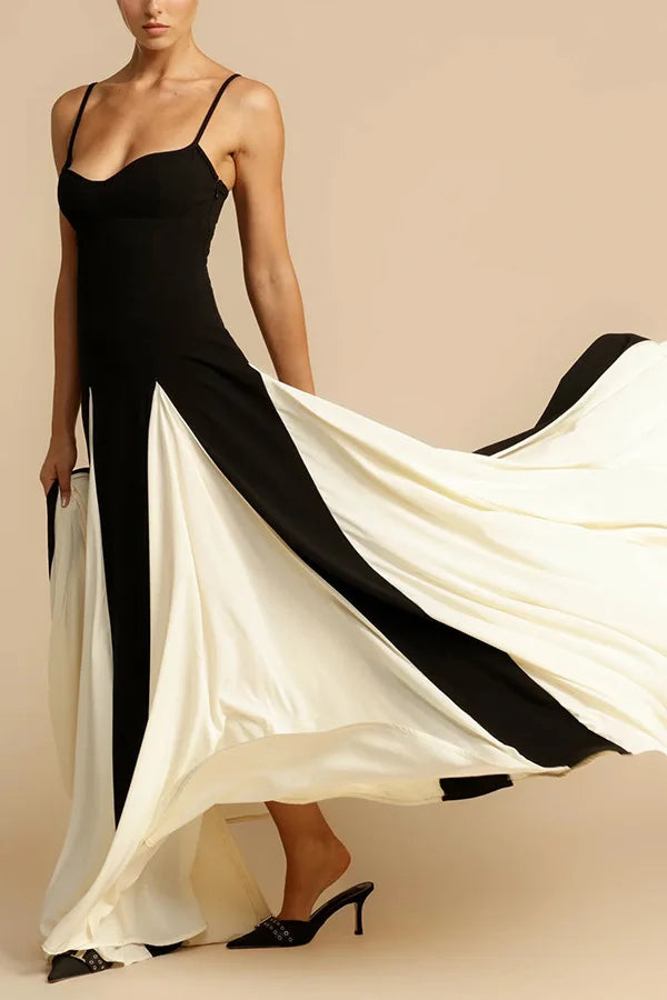 Vestido Adele em movimento, com saia ampla bicolor fluida que valoriza o caminhar com elegância.

