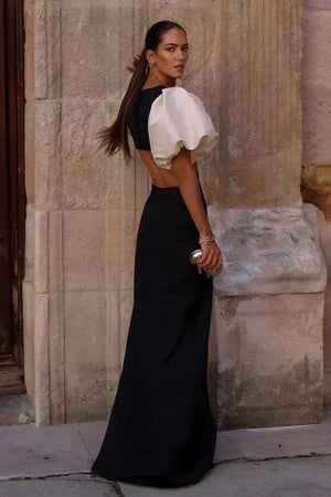 Vestido Margot elegante com costas abertas, recortes na cintura e mangas bufantes estruturadas