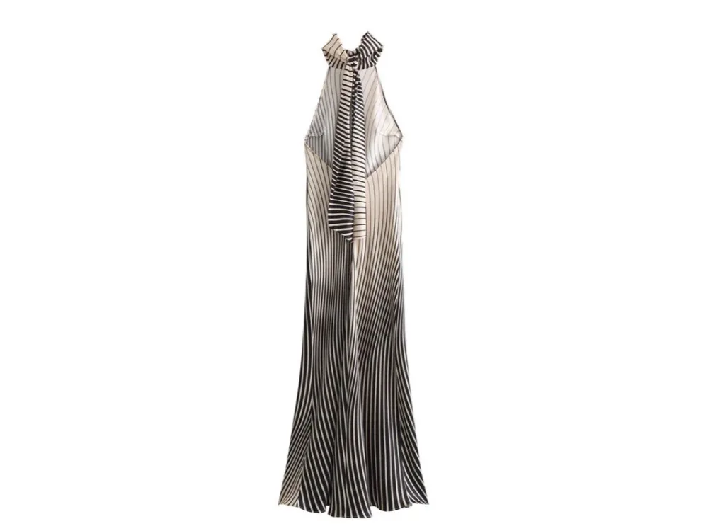 Vestido Riviera visto de costas com gola halter e amarração sofisticada.