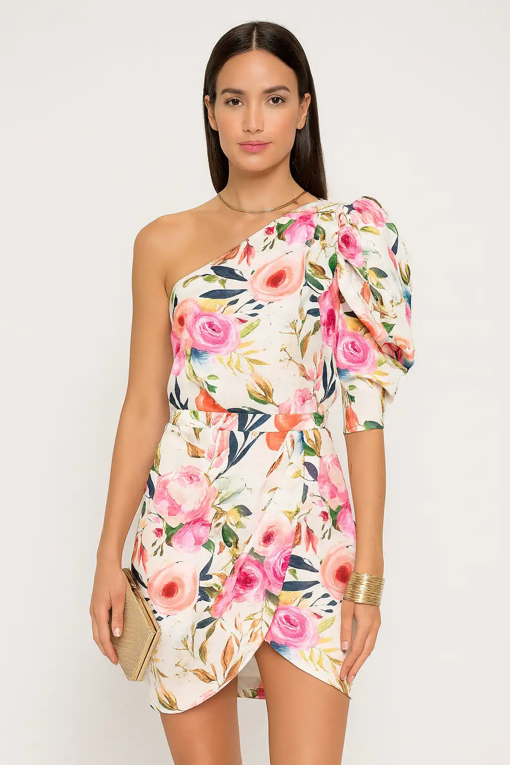 Vestido curto floral de um ombro só com manga bufante e saia transpassada, ideal para eventos elegantes e ocasiões especiais.